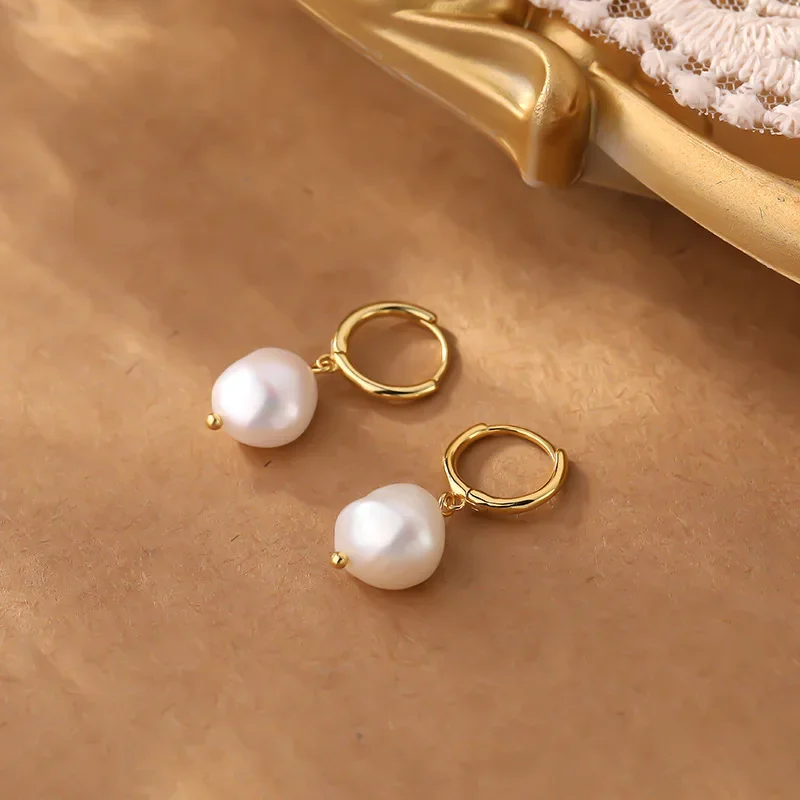 Boucle d'oreille perle en or