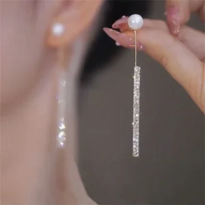 Boucle d'oreille perle et strass